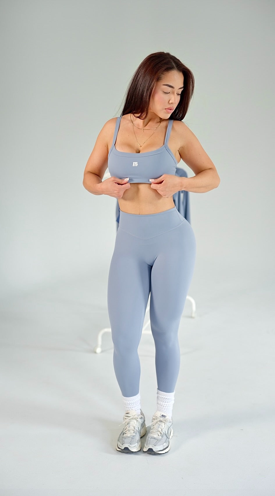 Aura Mystic Blue Set seated lifestyle image